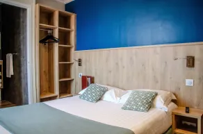Hôtel Arc En Ciel - Chambre