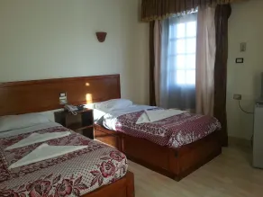 El Mesala Hotel - Zimmer