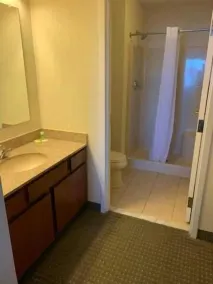 Host Inn an All Suites Hotel - Salle de bain