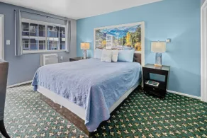 Bluebird Day Inn & Suites - Chambre