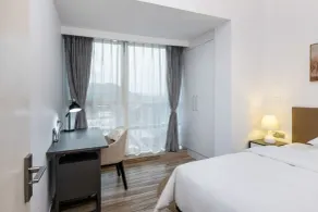 GOLDEN CENTRAL SERVICED RESIDENCE SHENZHEN (UPPER HILLS) - Vue de la chambre