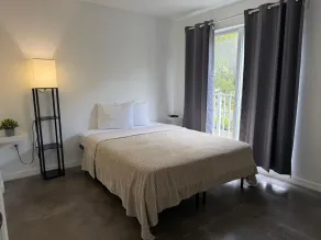 Triangle Suites LLC - Værelse