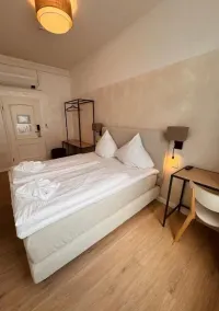 dingdong bonn - city apartments - Chambre