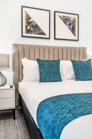 Essence Suites Taringa - Room