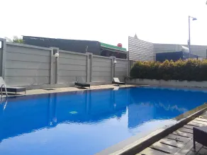 Cozy and Simply Studio Tifolia Apartment near Kelapa Gading By Travelio - Pool