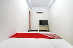 OYO 91322 Jawara Guest House Syariah - Room