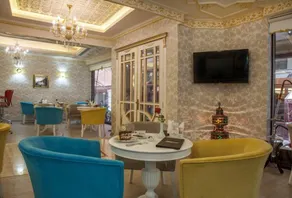 Empire Suite Hotel - Restaurant