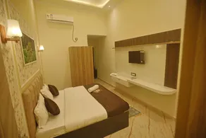 Hotel Om Vilas - Habitación