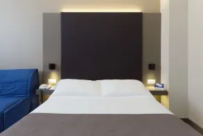 City Hotel & Suites - Chambre