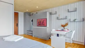 Evi's Home Hotel & Apartments - Chambre