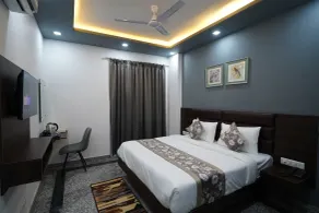 Posh Garden Inn - Quarto
