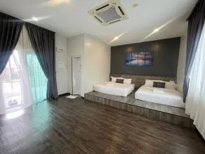 Capital O 91170 Kurau Bay Hotel - Habitación