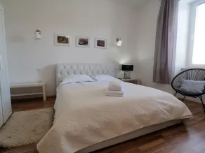 Captain Emo City Apartments - Chambre