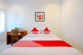 Hotel O 88 Exclusive Guesthouse - Zimmer
