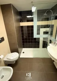 Iris Hotel - Baño
