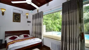 Thevni Holiday Resort - Chambre