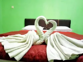 Four Hostel Bandar Lampung - Room