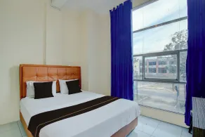 Hotel O Pekanbaru near Mall Ciputra Seraya formerly Lotus Inn - Room