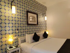 Hotel Aura by Woco Stays - Room