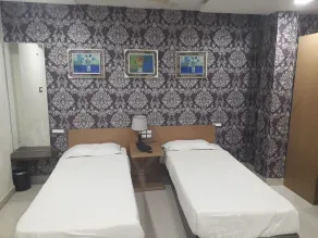 Hotel Kasturi International - Chambre