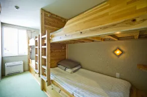 Aso Base Backpackers - Chambre