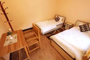 Aarya Chaitya Inn - Zimmer
