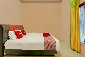 Hotel O Efniati Homestay Syariah - Chambre