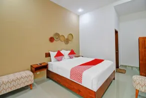 Hotel O Madania Guesthouse Syariah - Rum