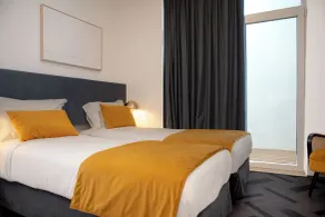 Glória Suites Hotel by Succeed - Chambre