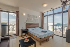 Seashells Penthouse Seaview Terrace by Getaways Malta - Room