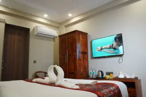 Treebo Aashirwad Bliss Inn With Swimming Pool - Zimmer