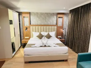 Grand Plaza Inn by RAK Rooms, Kannur - Chambre