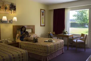 Hotel Paradise Inn - Chambre