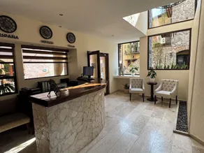Porta Paradiso ValQuirico, Albergo Boutique - Rezeption