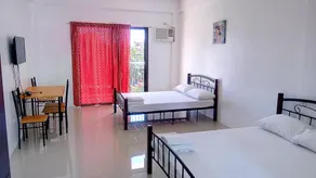 The Palines Apartment Hotel near Evia Mall Alabang - Chambre