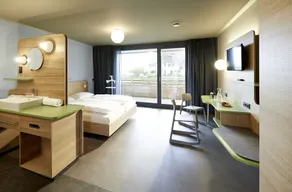 Inselzimmer Superior, mit Dusche/WC und Balkon, 31 m² - Camera