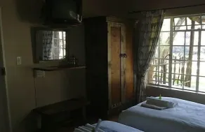Mologa River Lodge - Zimmer
