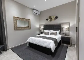 Luxe Suites Boutique Hotel - Zimmer