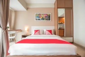 OYO Flagship 755 Appartel Grand Dhika City - Room