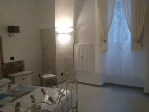 Agorà Suites & Apartments - Vista do quarto