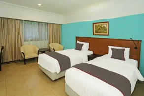 Collection O 91898 Series Hotel Kuningan - Habitación