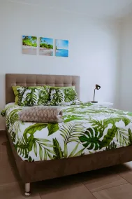 The Palm Leaf Apartments - Room