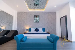 Joi Home Beachfront - Chambre