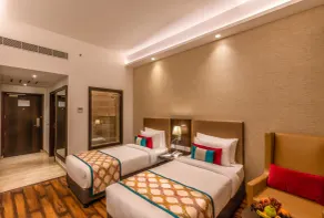 Divine Clarks Inn Suites - Habitación