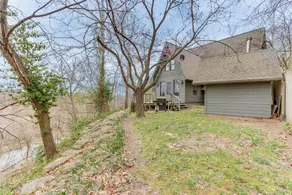 Riverfront Baxter Springs Home w/ Deck & Grill! - Interior
