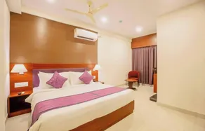 Classio Inn Hotel - Living area