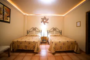 Hotel Hacienda del Sol - Habitación