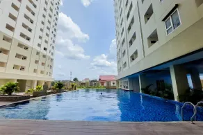Comfort and Modern Look 2BR Loftvilles City Apartment By Travelio - Pool