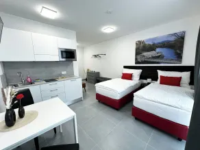 Grazora Living Apartments - Room