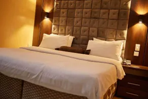 Coronia Hotel - Zimmer